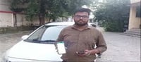 UP Journalist Fined for Helmet Violation While Driving Car